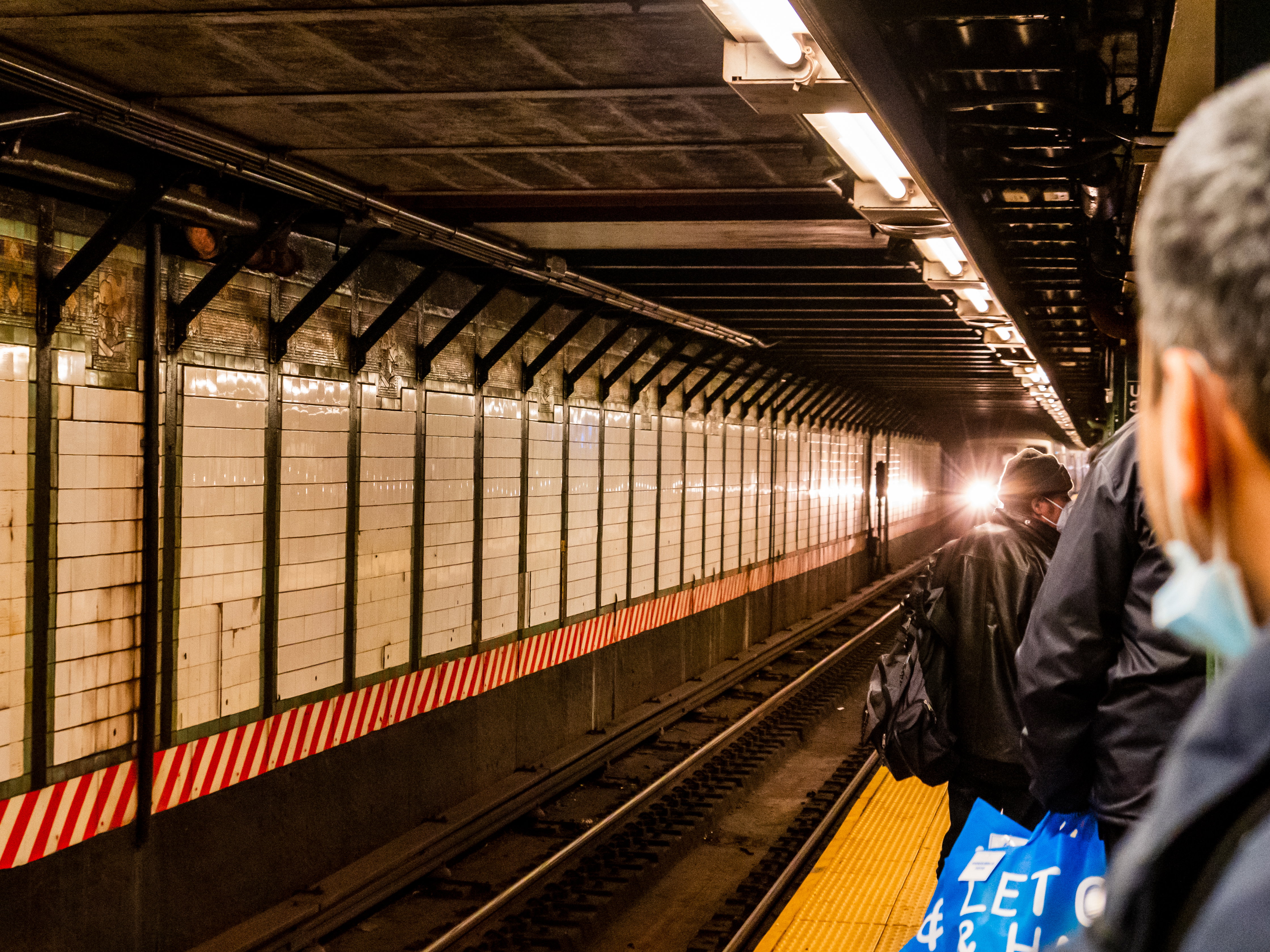Train Approaching Subway Platform with People Waiting - Free Stock ...