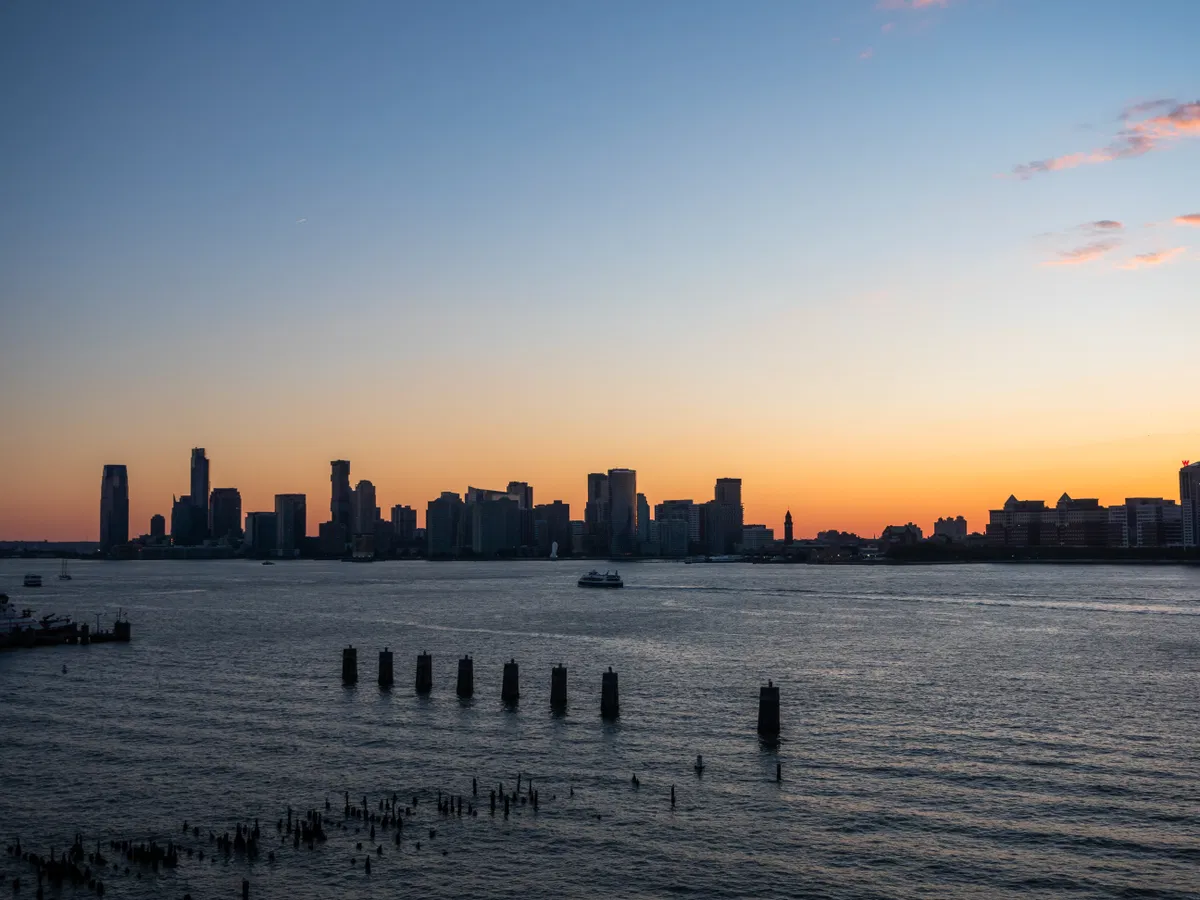 Sunset Over River and Buildings - Free Stock Photo | FOCA Stock